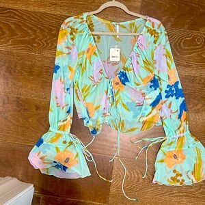 Free People.  Size small.  Brand new with tags.  Never worn.